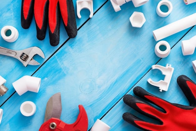 A close-up shot of various plumbing tools neatly arranged on a workbench, including wrenches, pliers, Teflon tape, and a small container of plumber's putty.