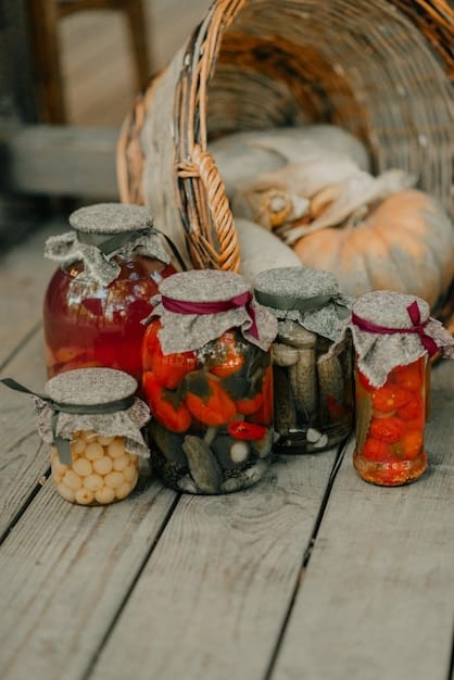 A rustic pantry shelf filled with various jars of home-canned jams, pickles, and dried herbs, reflecting a sustainable approach to food preservation.