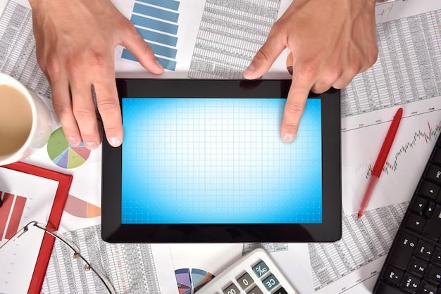 A person using a laptop to calculate debt-to-income ratio and comparing different debt consolidation options. The screen shows various financial calculators.
