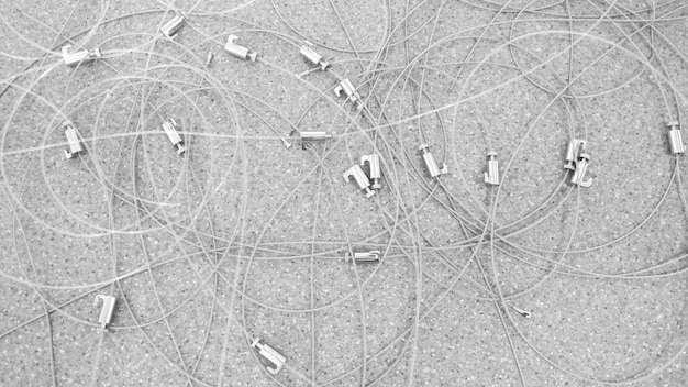 A split image showing a tangled mess of wires on one side, representing disorganized finances, and neatly organized wires on the other, representing well-managed finances after credit counseling. The image visually communicates the transformation achieved through credit counseling.