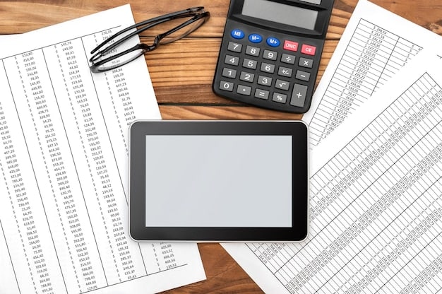 A close-up of a calculator and financial documents on a desk, symbolizing the calculations involved in the bankruptcy means test.