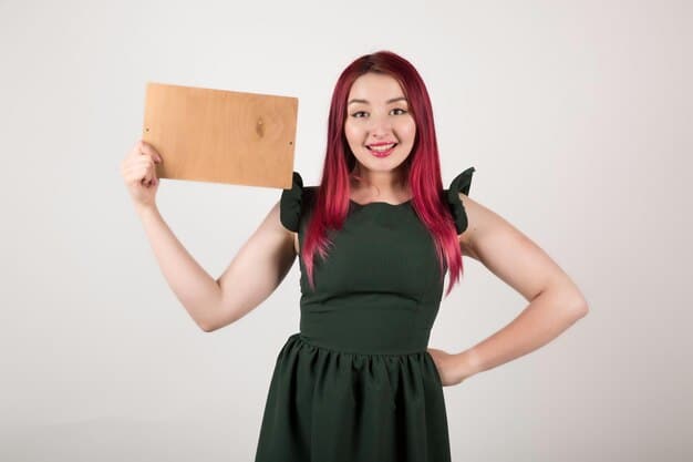A person confidently holding a letter with the words 