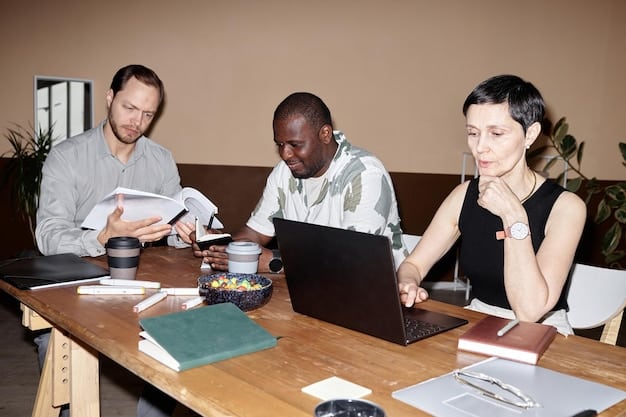 A diverse group of people sitting at a table with laptops and documents, discussing financial strategies, depicting collaborative problem-solving for debt management.