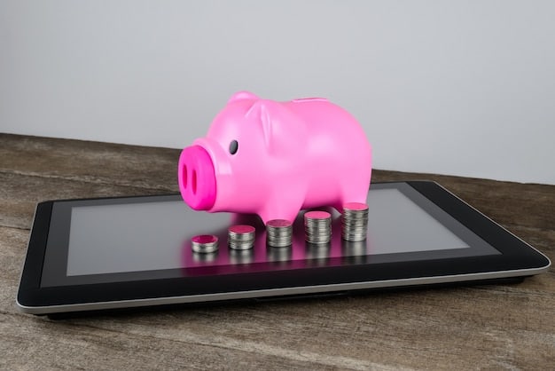 A person holding a piggy bank and looking at a financial chart on a tablet, symbolizing financial planning and savings related to debt repayment.