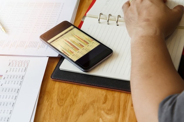 A person using a budgeting app on their smartphone, with charts and graphs displaying income and expenses, symbolizing mobile finance management and real-time tracking.