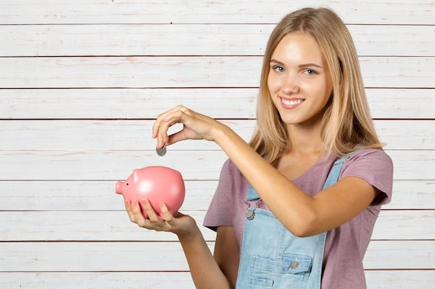 A woman happily putting money into a piggy bank, representing the consistent effort required to build an emergency fund.