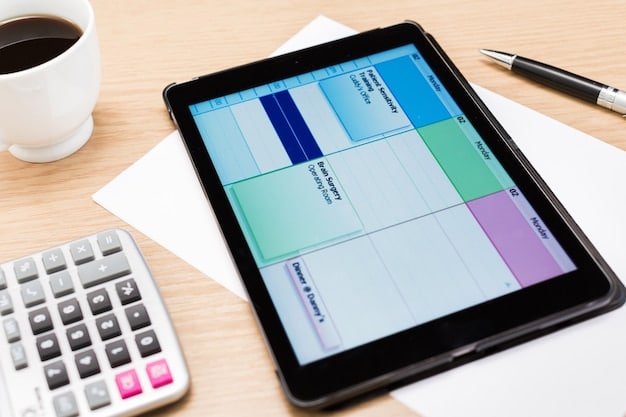A laptop screen displaying the YNAB (You Need a Budget) app interface. The screen shows a detailed budget with various categories and amounts allocated and spent. The layout is clean and professional looking.