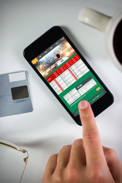 A close-up of a smartphone screen showing a credit card app's rewards dashboard, with a graph illustrating points accumulated over time and options to redeem for travel or cashback.