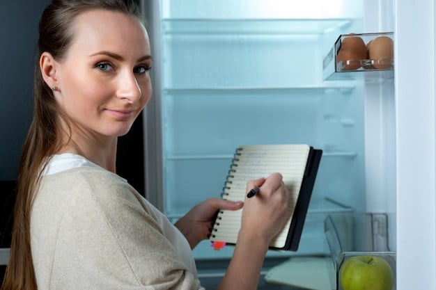 A person examining the EnergyGuide label on a new refrigerator, highlighting energy efficiency ratings and potential cost savings.