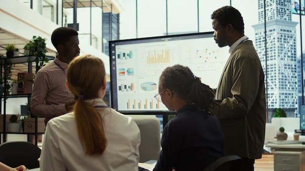 A diverse group of people discussing investment strategies, with digital charts and graphs on a board in the background, representing forward-thinking financial planning.