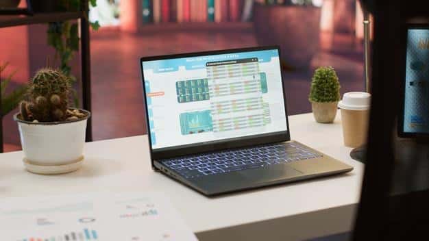 A budget spreadsheet or app on a computer screen showing various categories with allocated amounts, representing the detailed planning involved in a zero-based budget.