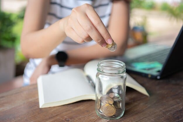A person happily placing coins into a series of transparent jars labeled